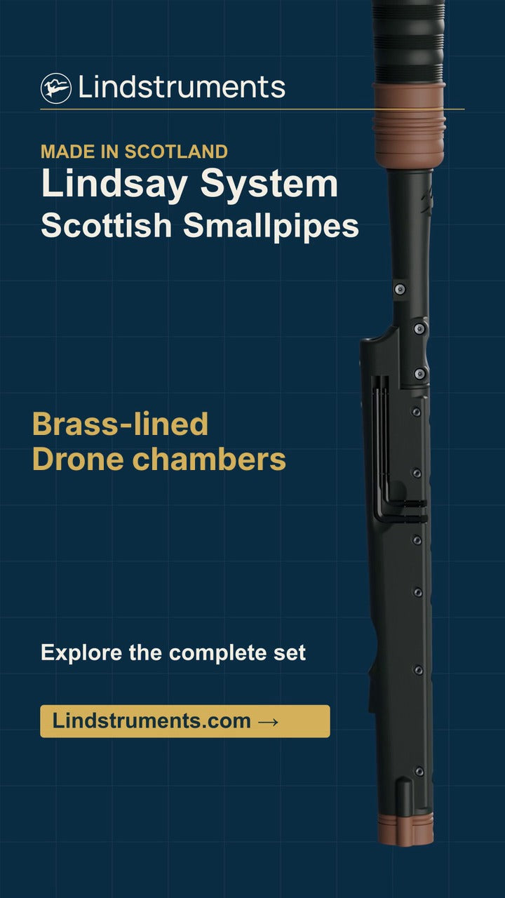 Lindsay System Scottish Smallpipes rotating from a vertical chanter close view over a cutting mat